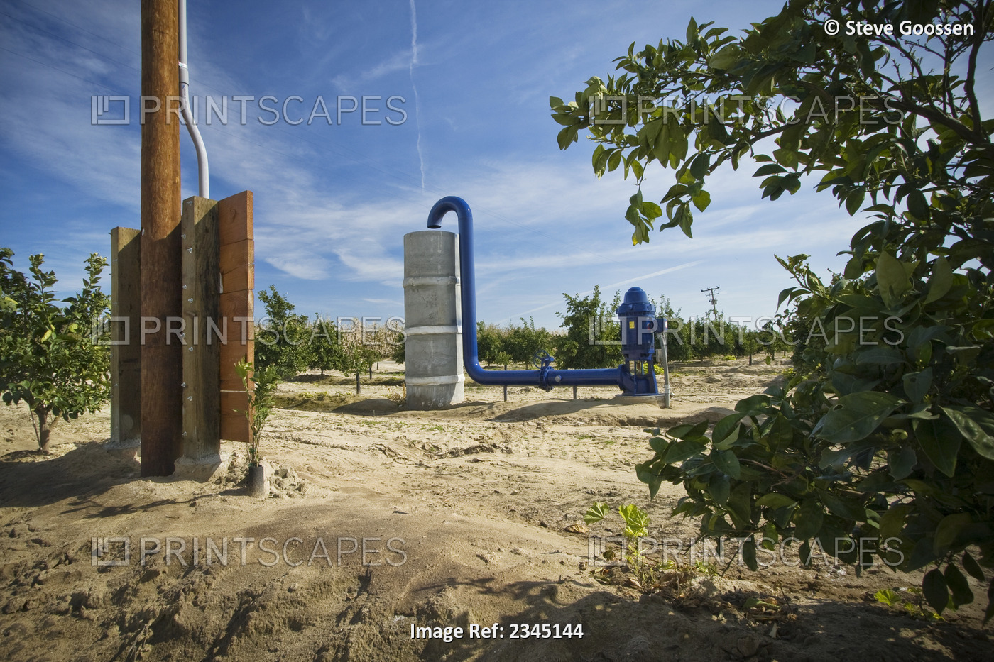 Agriculture - Electric powered irrigation water pump and standpipe in an orange ...