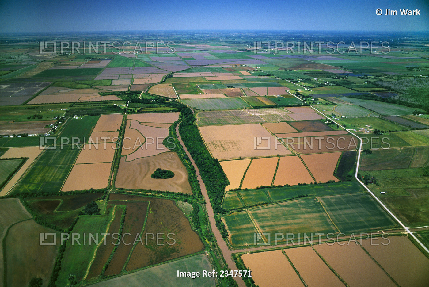 Agriculture - Aerial view of rice fields in Spring in stages of flooding and ...