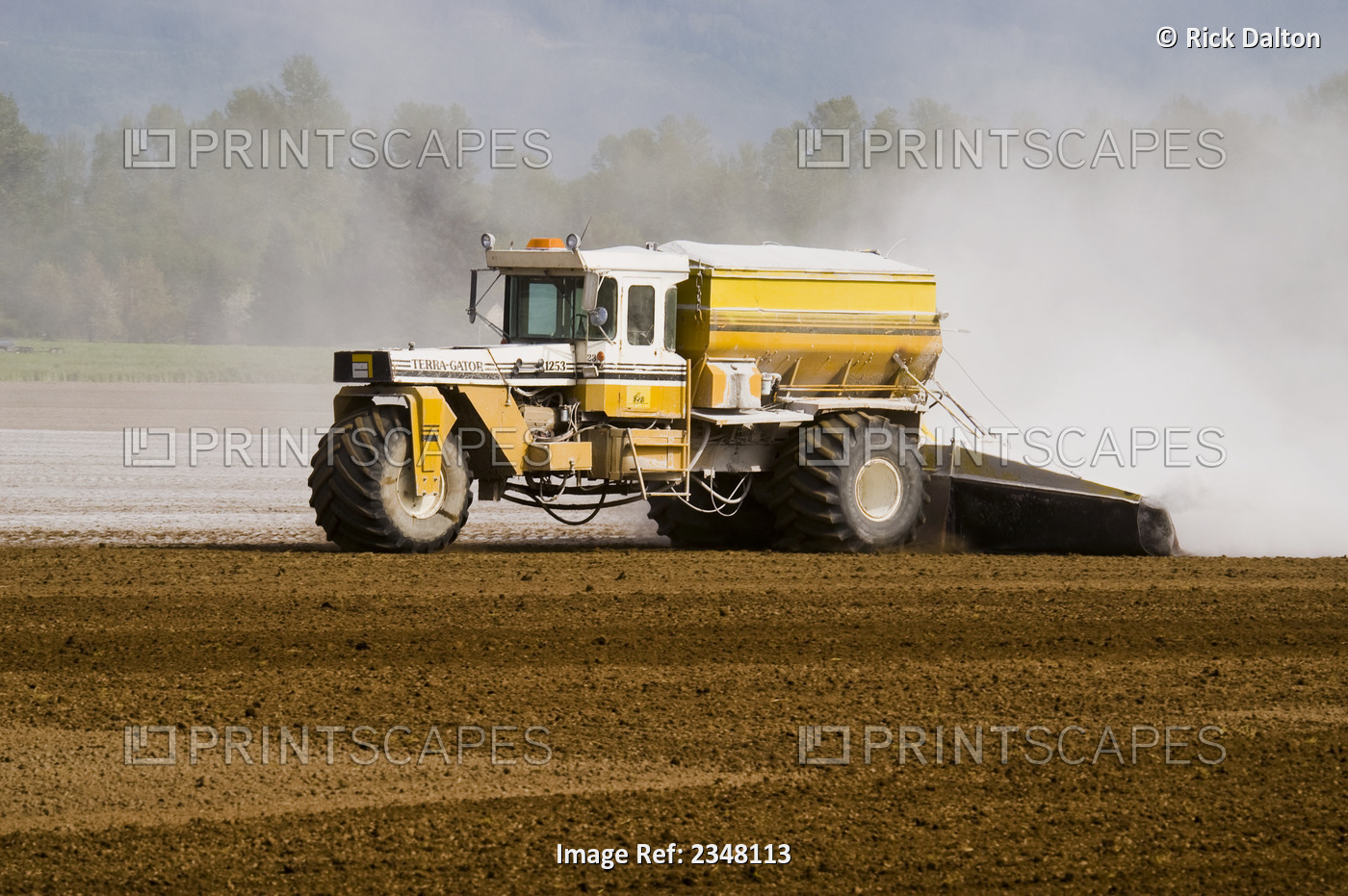 Agriculture - Application of lime by a TerraGator to a field prepared for ...