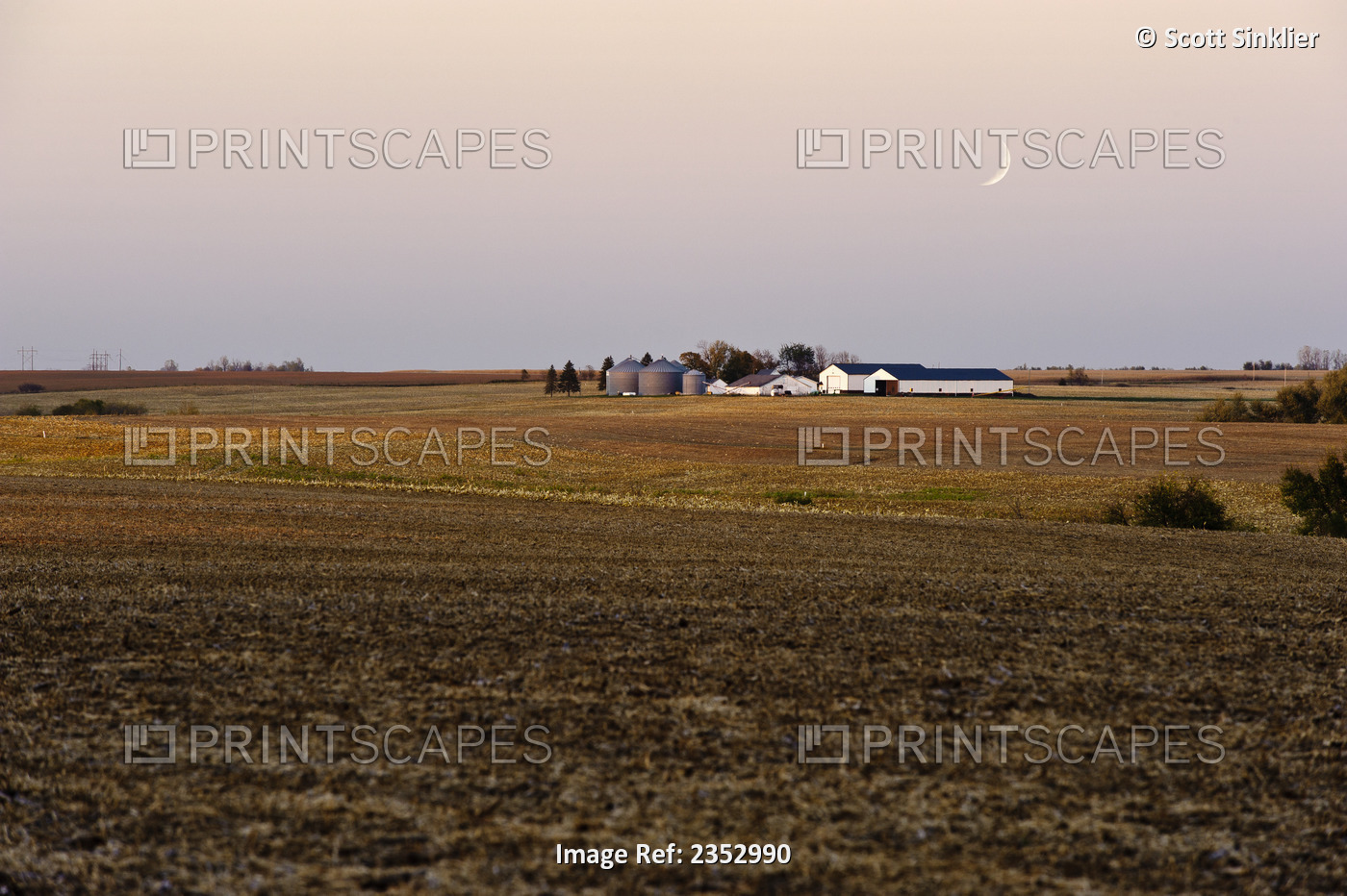 Agriculture - A farmstead stands out from surrounding harvested corn fields at ...