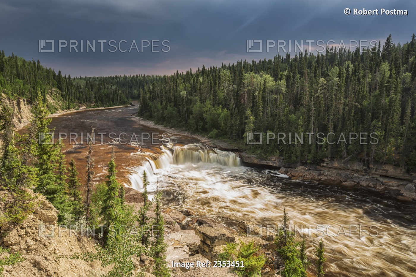 Sunlight Illuminates The Trout River Flows Over Coral Falls; Northwest ...