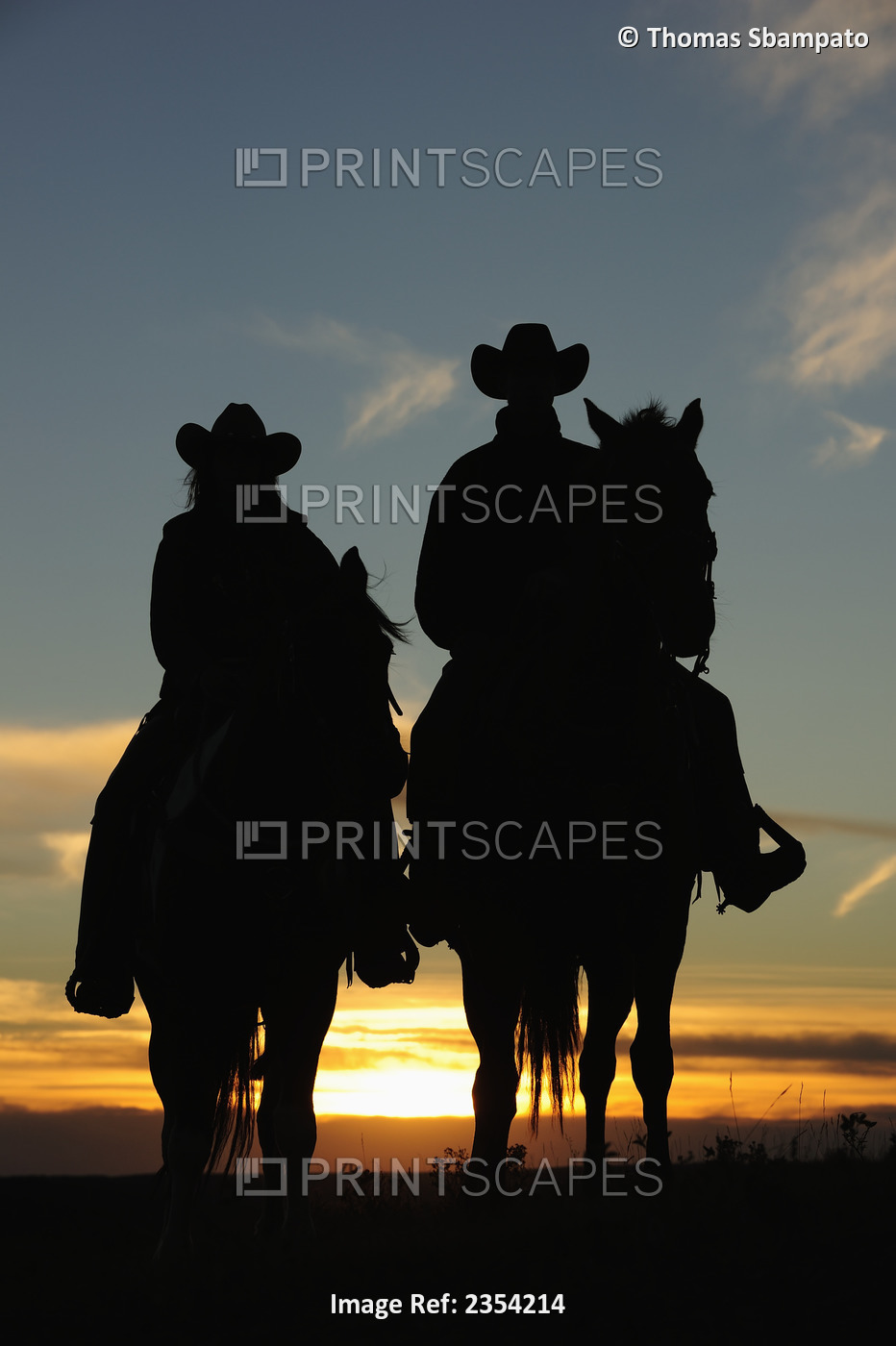 Cowboy And Cowgirl Riding Their Horses On A Warm Summer Evening On A Hill And ...