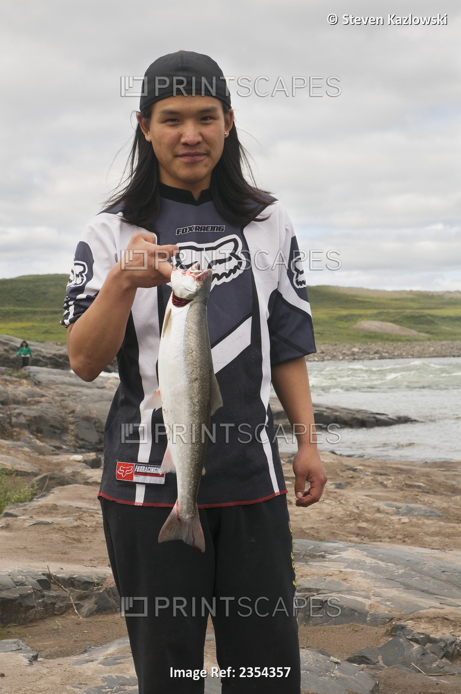 Inuit Man With Arctic Char Catch Along The Coppermine River, Kugluk/Bloody ...