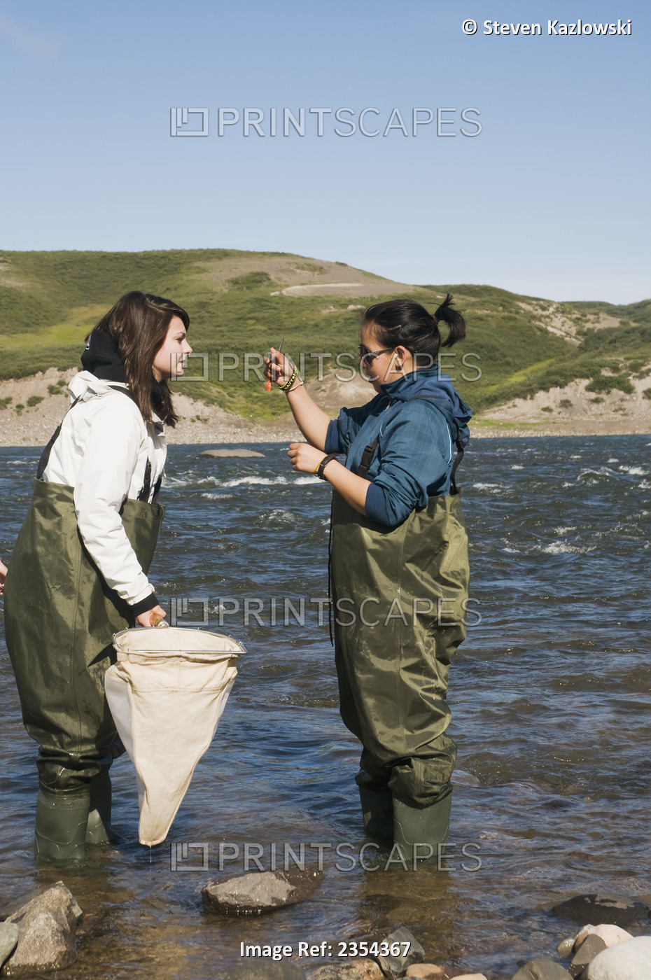 Researcher Collects Samples From The Coppermine River; Kugluktuk, Nunavut, ...