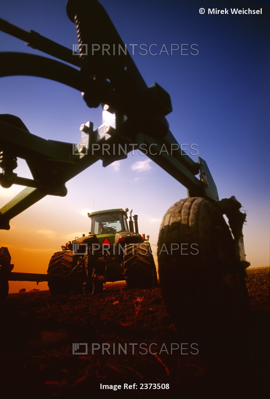 Agriculture - Low angle view of a John Deere tracked tractor and air till drill ...