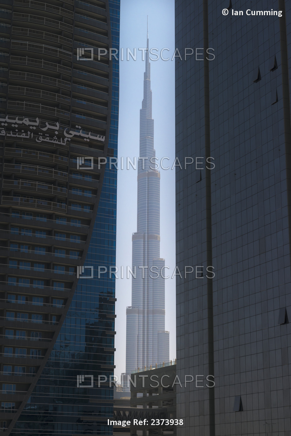 Looking Between Two Tall Office Buildings To The Burj Khalifa; Dubai, United ...
