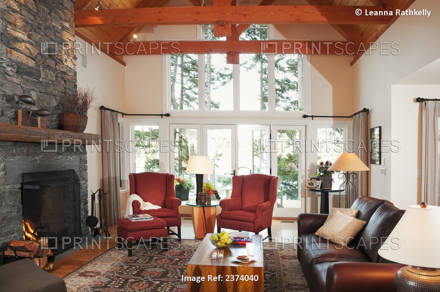 Living Room With Fireplace Of Home With An Ocean View; Mayne Island, British ...