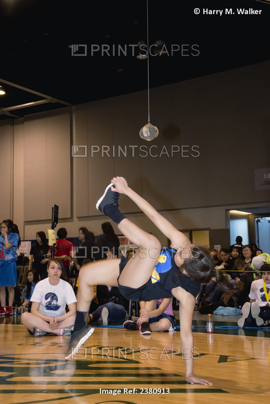 Girl's Alaskan High Kick Competition During The 2013 Native Youth Olympics, ...