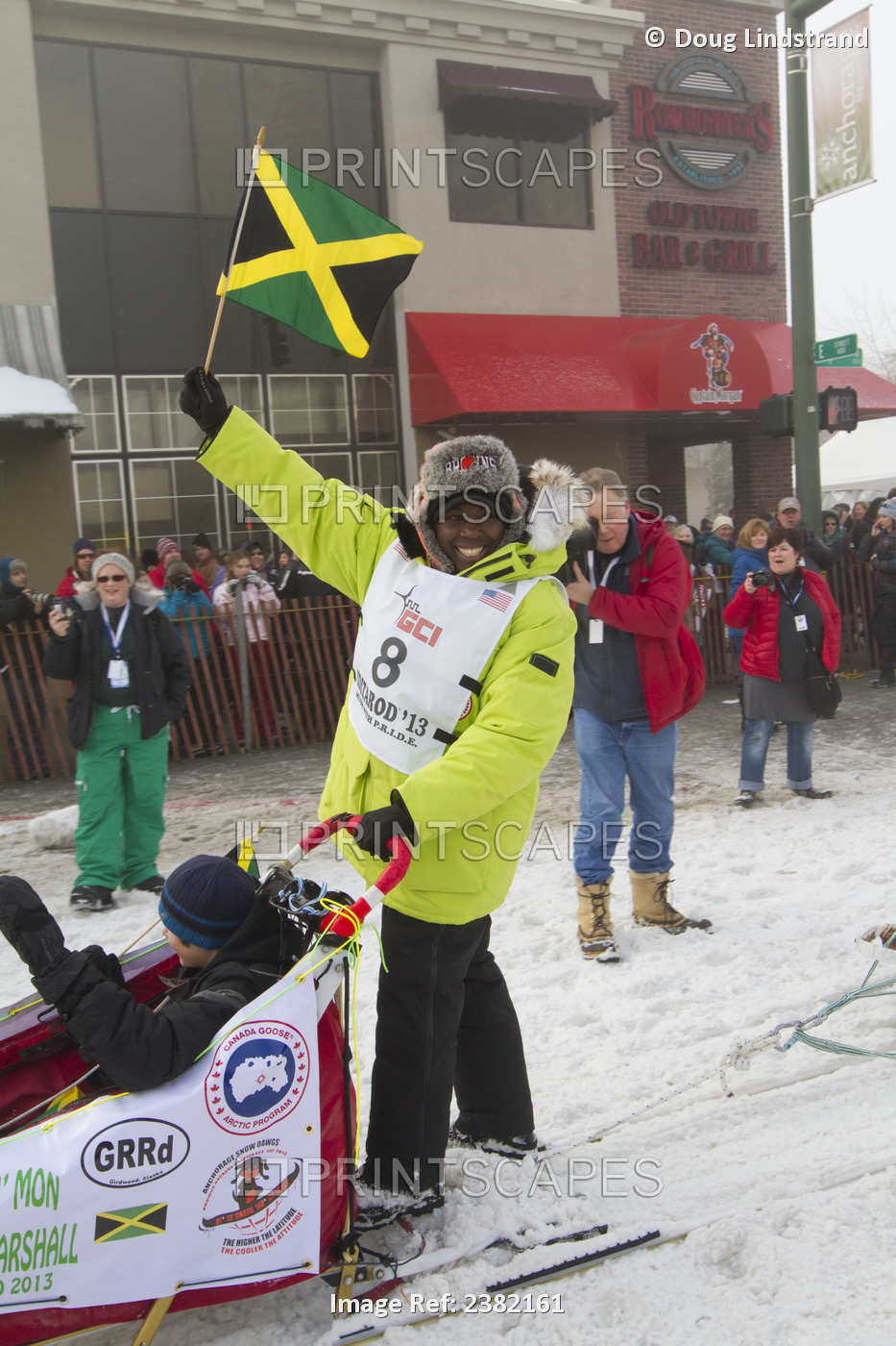 Musher Newton Marshall From Jamaica Raises His Country Flag As He Drives His ...