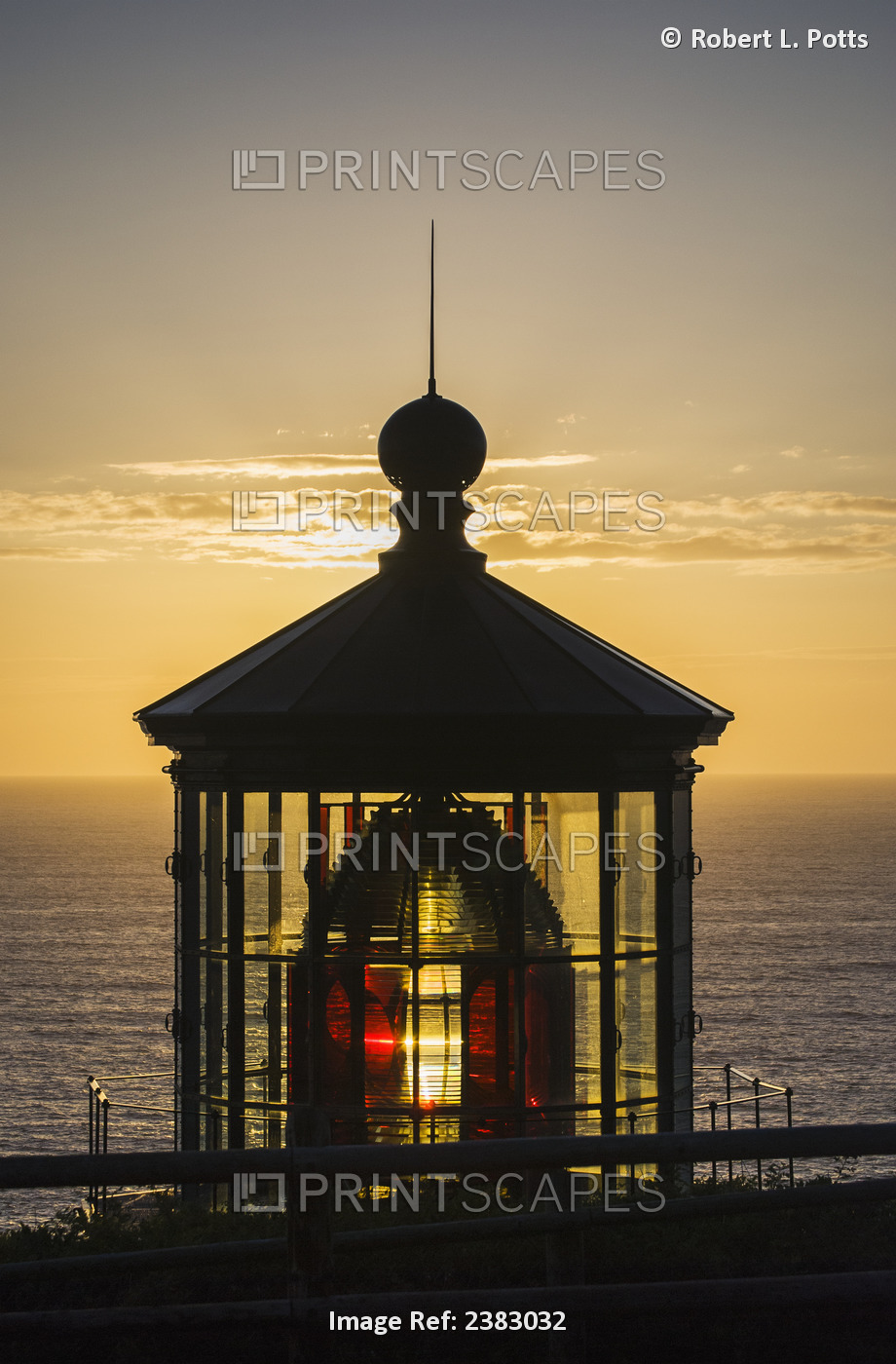 The Sun Sets At Cape Meares Lighthouse; Oregon, United States Of America