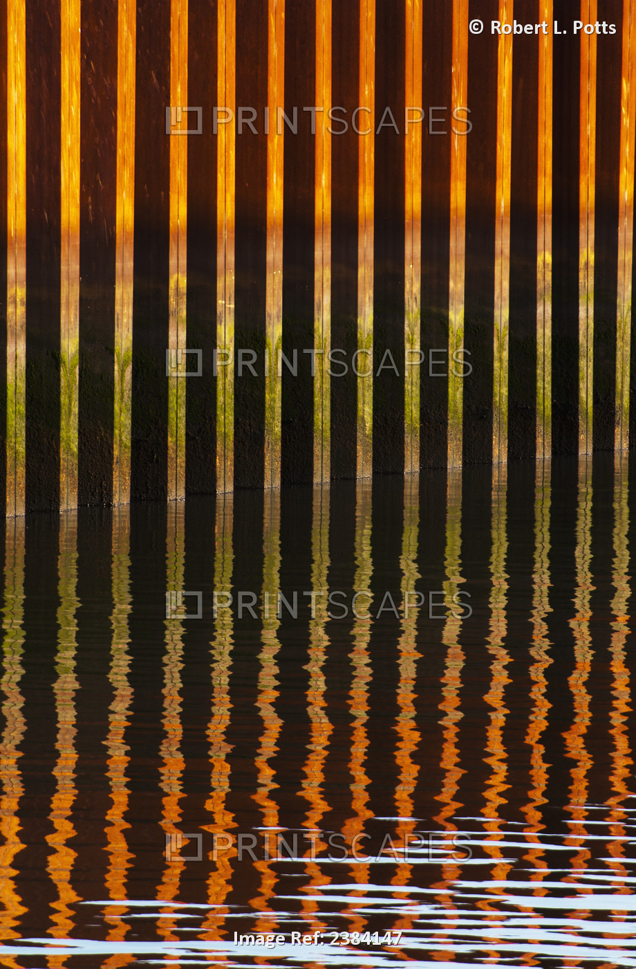 Water Reflects In The Harbour; Astoria, Oregon, United States Of America