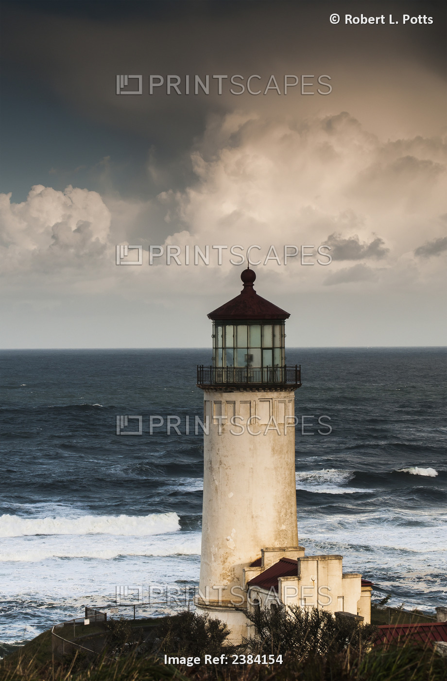 North Head Lighthouse Complemented By Clouds And Surf; Ilwaco, Washington, ...