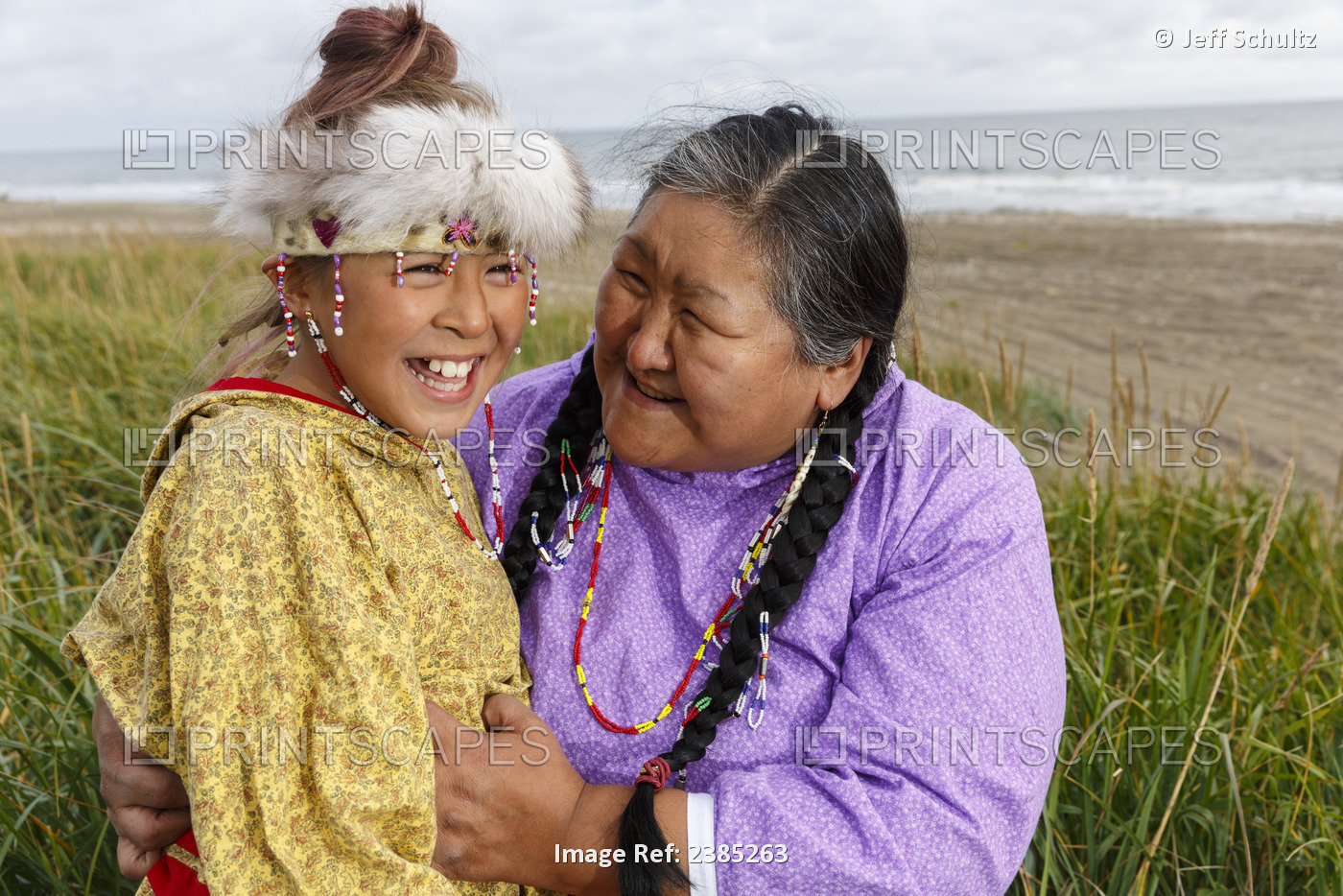 Portrait Of Yupik Eskimo Mother And Daughter Hugging And Laughing Wearing ...