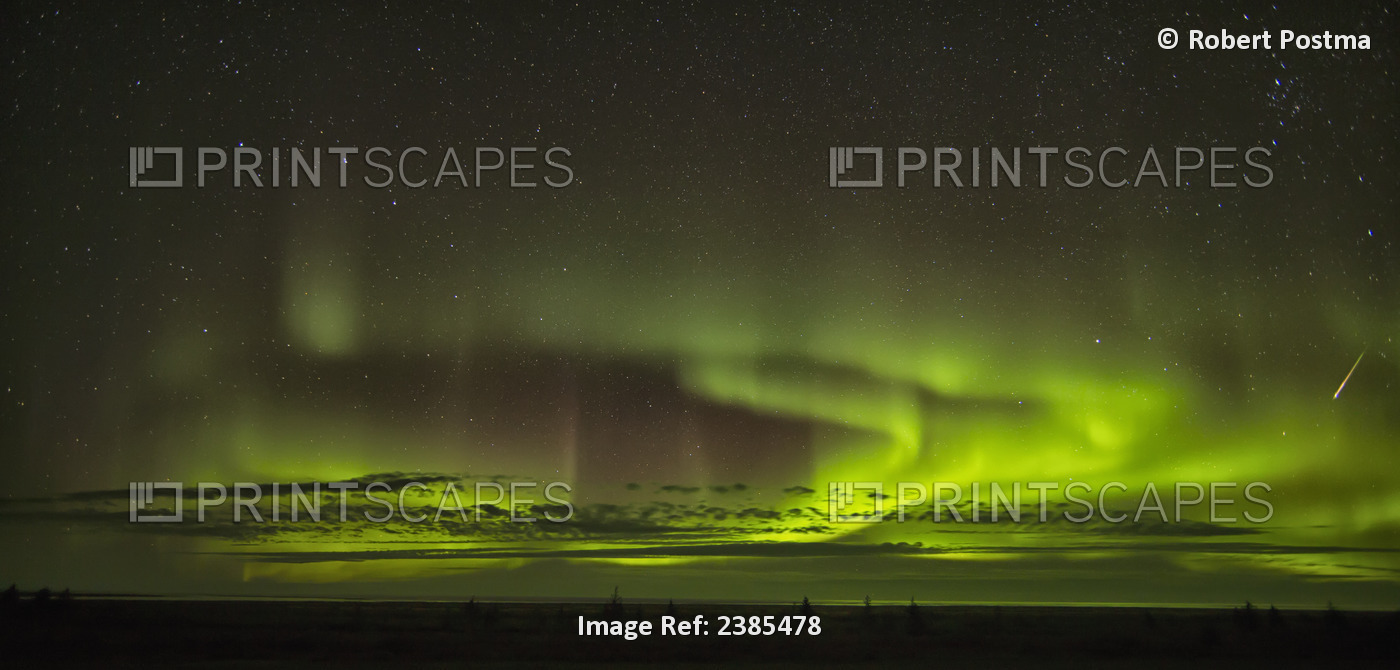 The Aurora Borealis And A Shooting Star Above Hudson Bay; Manitoba, Canada