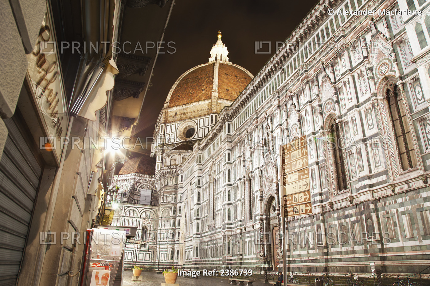 Buildings And Florence Cathedral Illuminated A Nighttime; Florence, Tuscany, ...