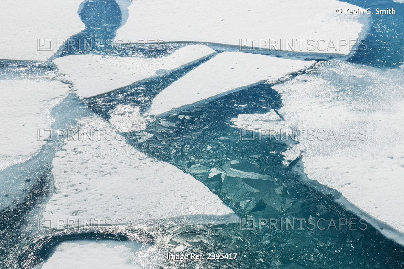 Ice Breaking Apart On The Surface Of Portage Lake In Springtime With Ice ...