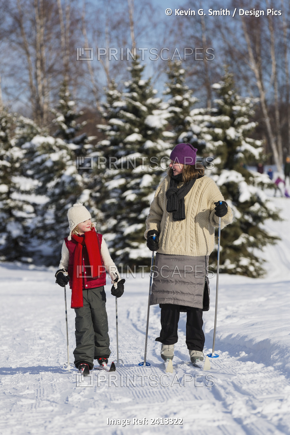 Mother And Young Daughter Cross Country Skiing In A Wooded Park, Russian Jack ...