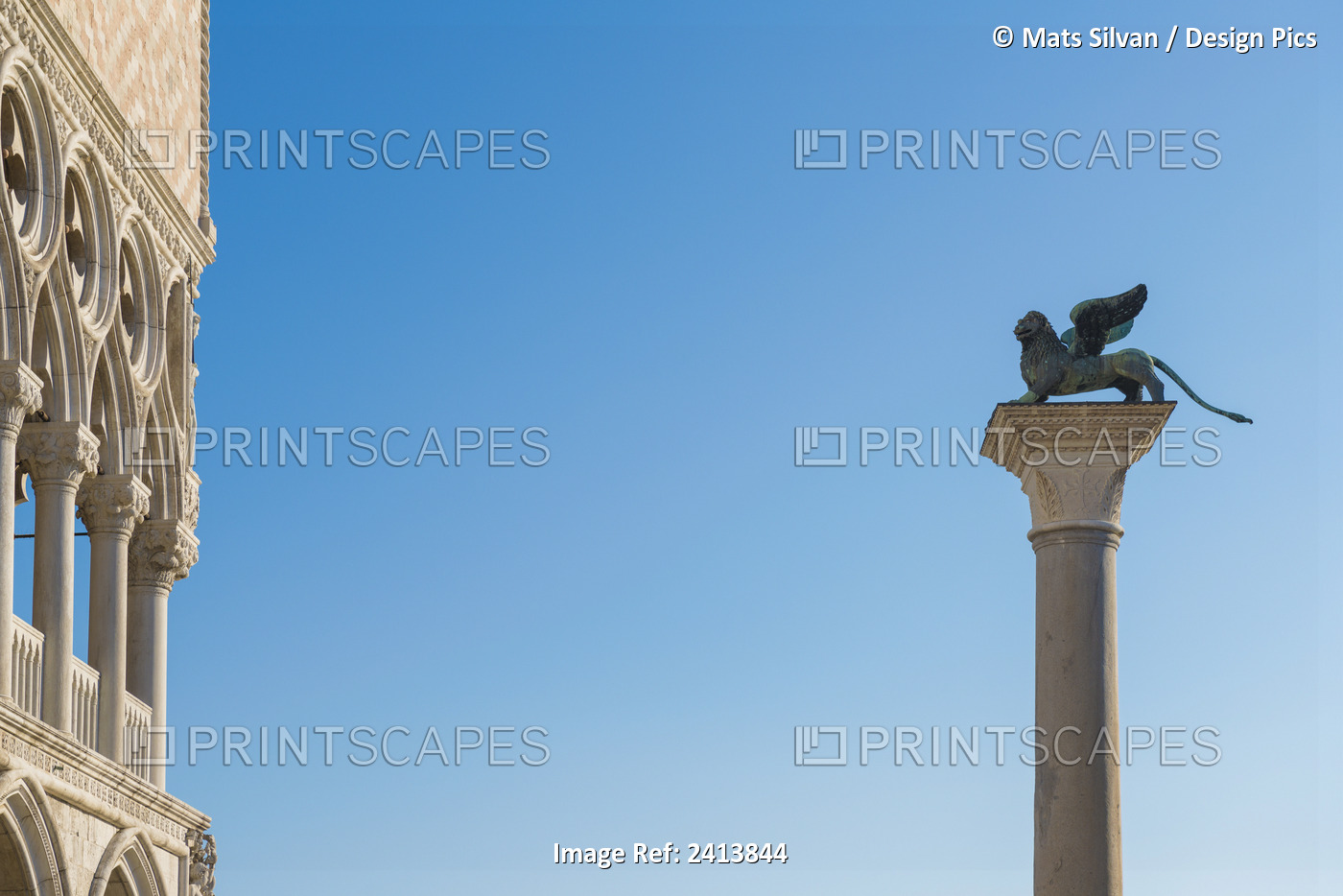 Statue On Top Of A Column Monument Against A Blue Sky; Venice, Veneto, Italy
