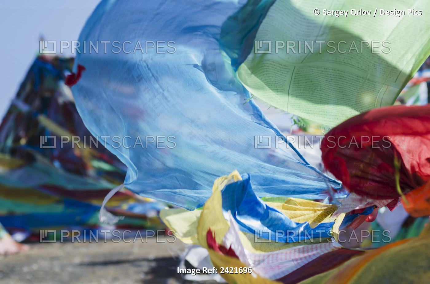 Blessing Colourful Tibetan Prayer Flags (Lung Ta) Under The Blue Sky; Tibet