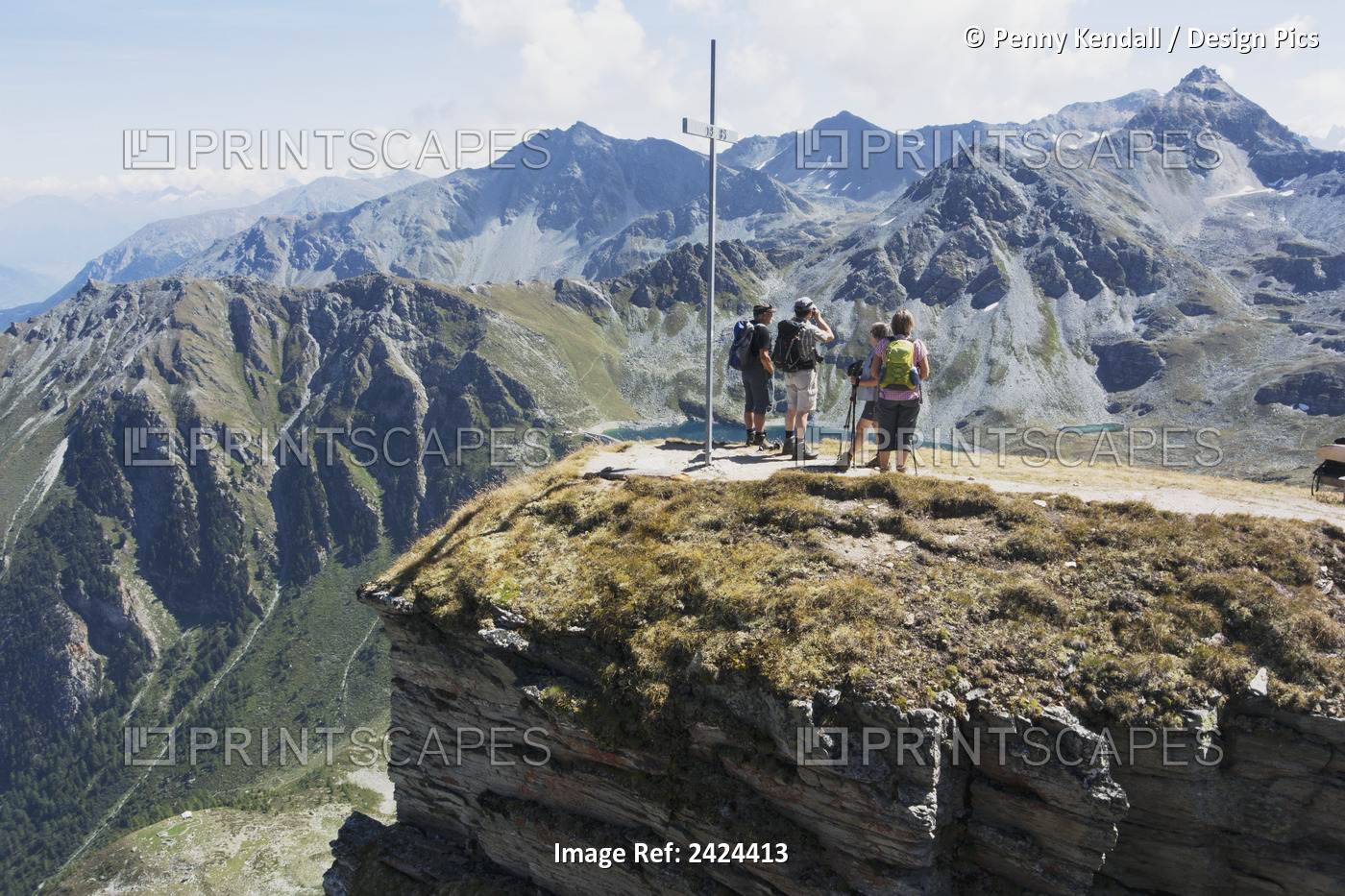 Walkers Stand On The Summit Of The Ilhorn And Take In The Panorama; Chandolin, ...