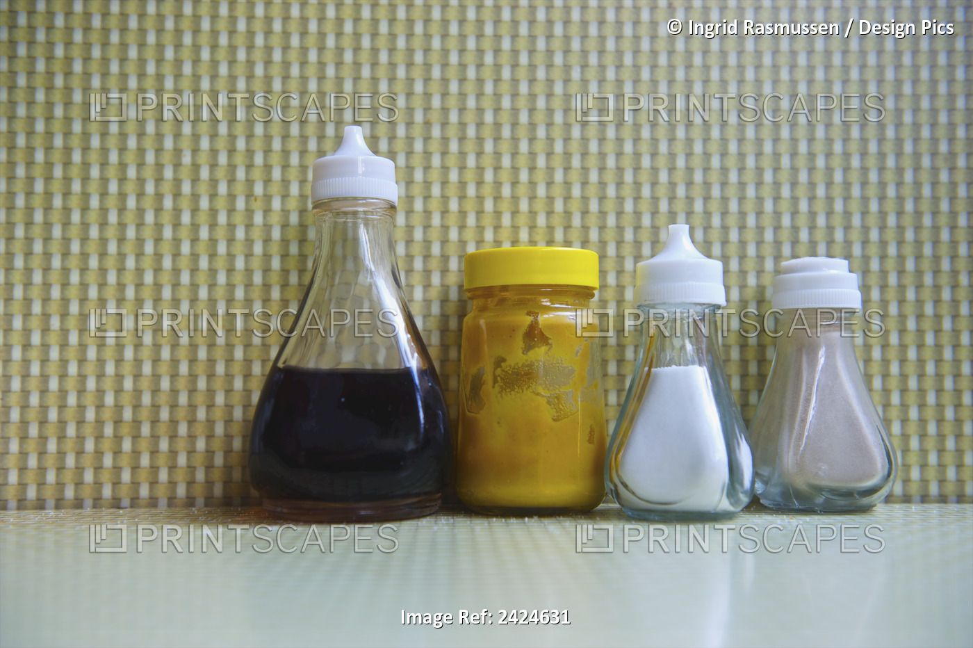 Condiments Lined Up On A Restaurant Table; London, England