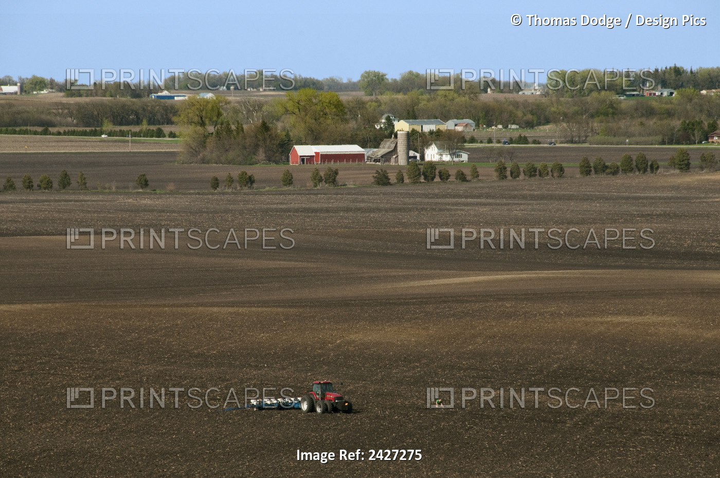 Agriculture - High Expansive View Of A Tractor And Planter In A Large Field ...