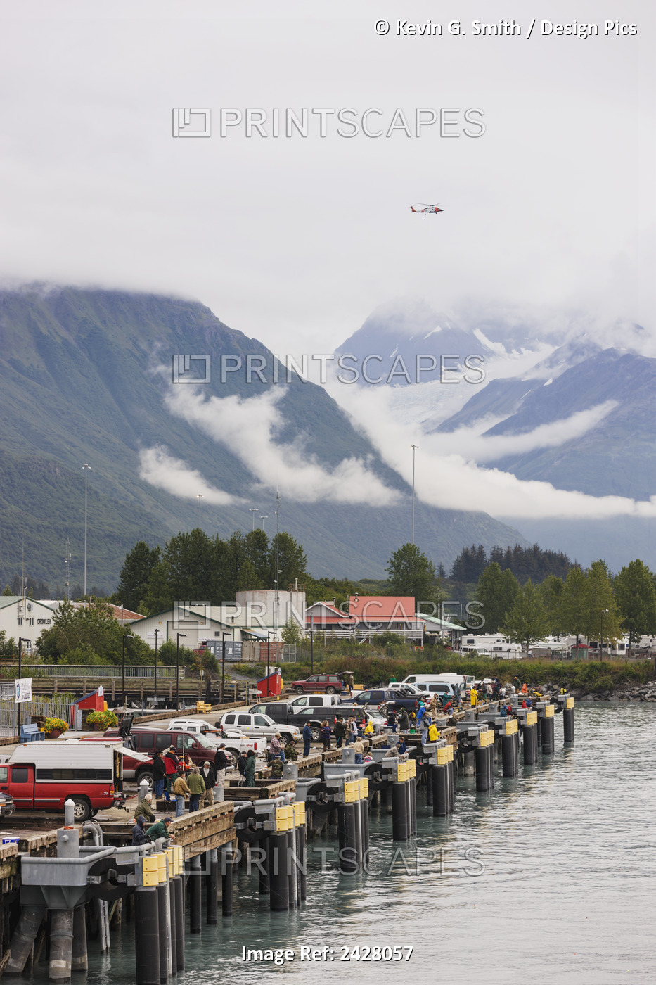 People Fishing For Silver Salmon From The Docks Of Valdez As A Coast Guard ...