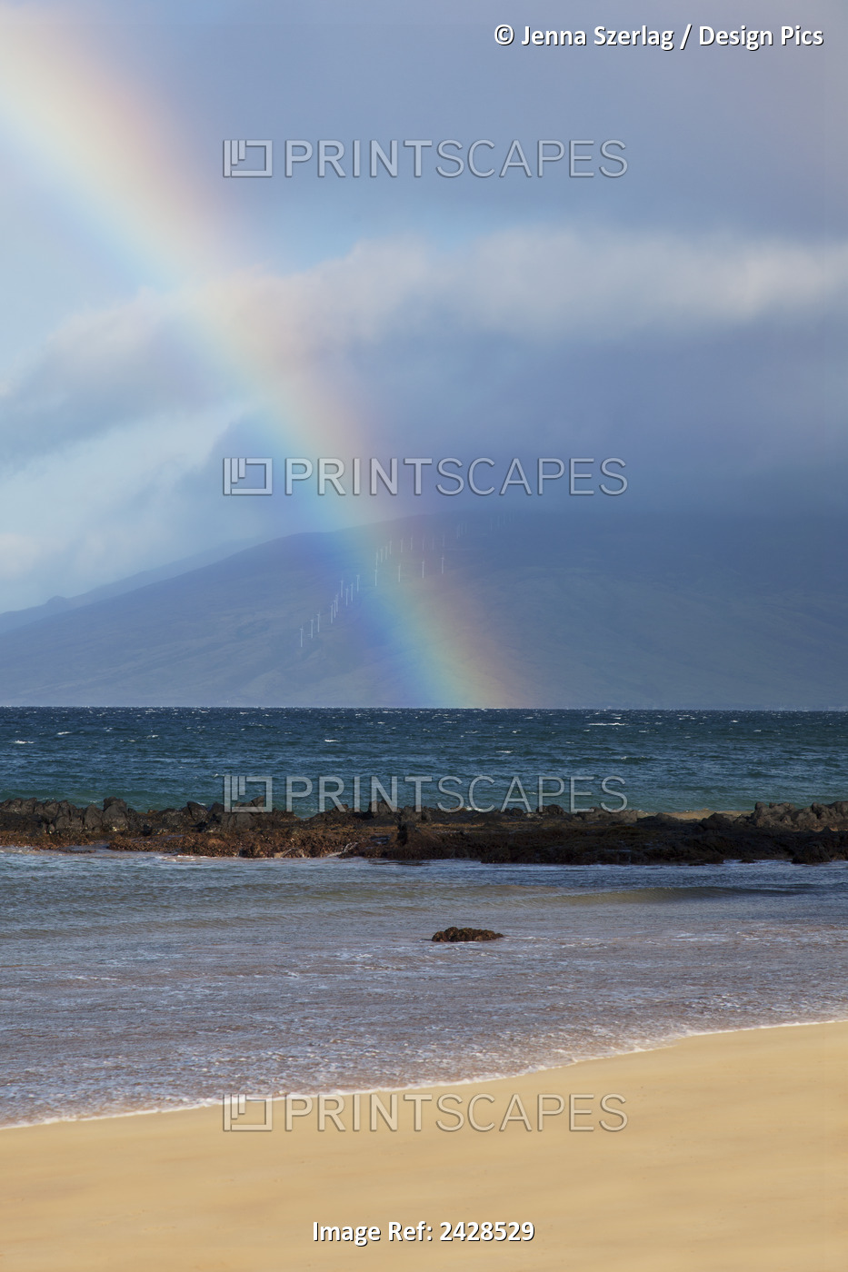 A Rainbow Forms Along Kamaole 3 Beach; Maui, Hawaii, United States Of America