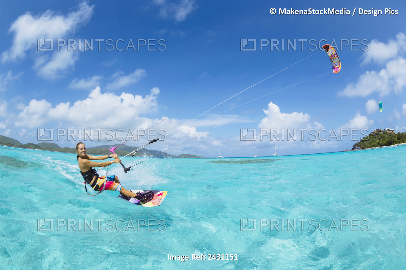 Professional Kiteboarder Susi Mai Kitesurfing Over The Crystal Blue Waters; ...