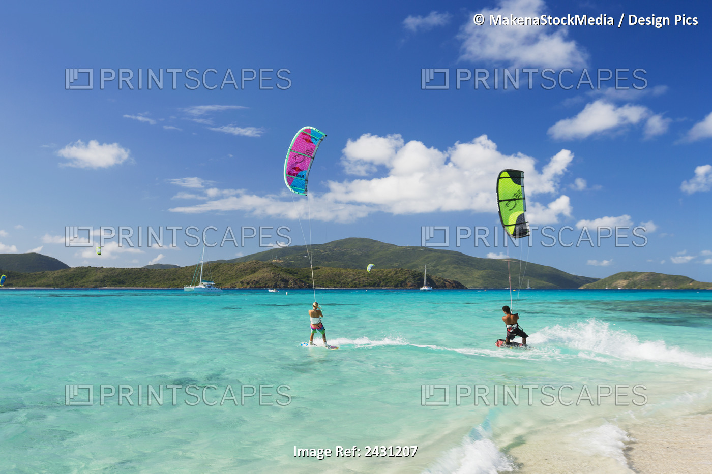 Kiteboarders Riding Over The Crystal Blue Waters; Necker Island, British Virgin ...