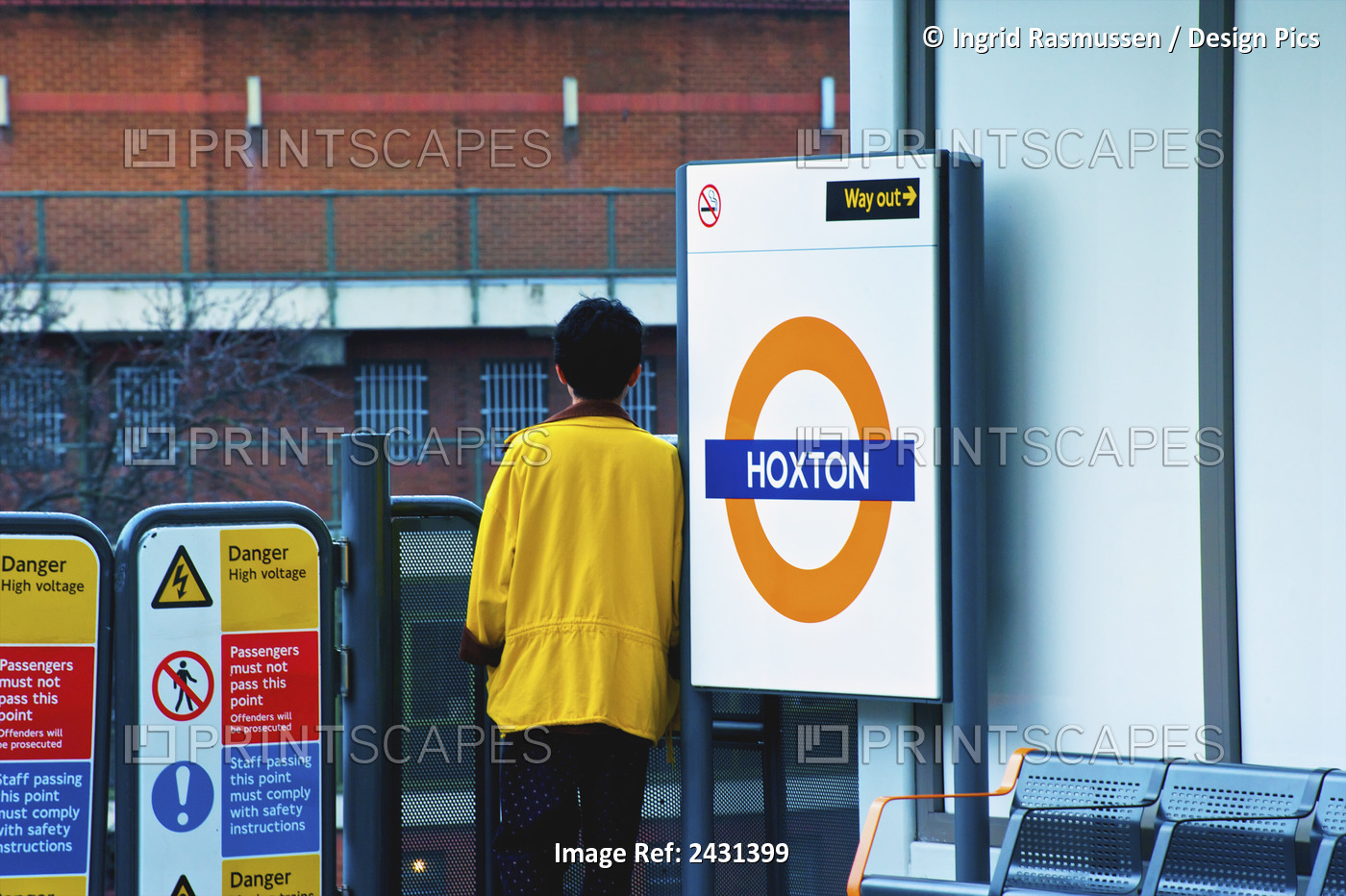 A Man Waits At The Hoxton Railway Station; London, England