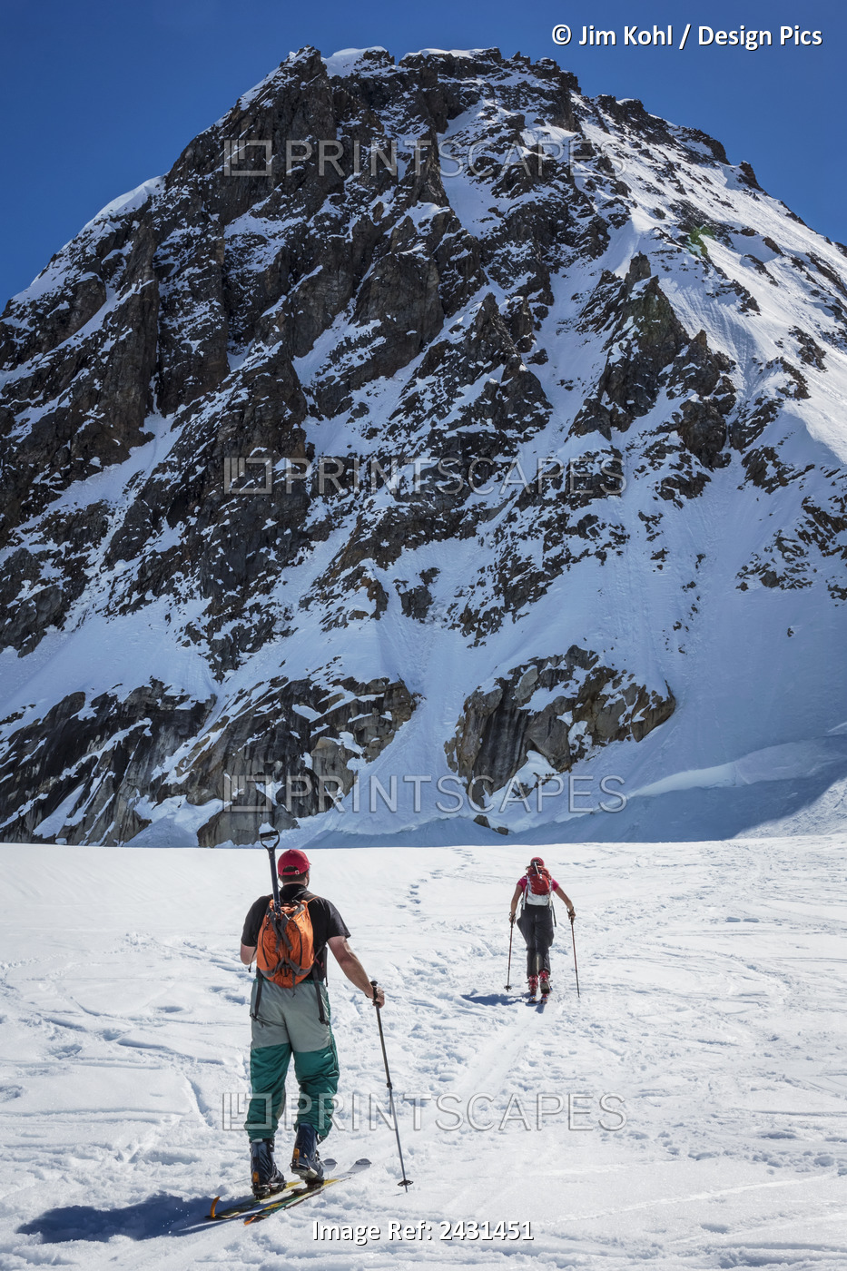 A Couple Telemark Skiing On The Ruth Glacier Near The Don Sheldon Hountain ...