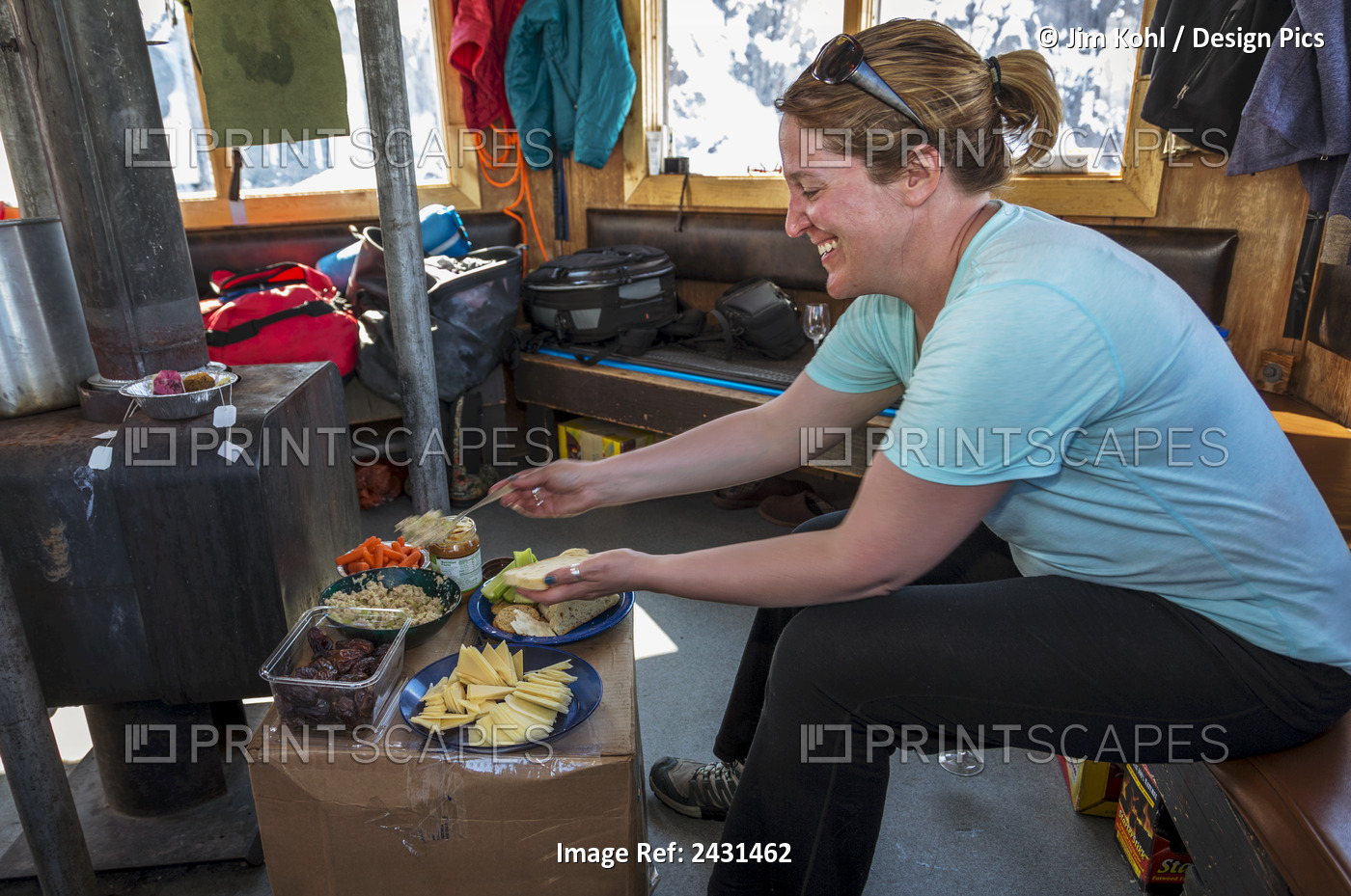 A Visitor Preparing Lunch At The Don Sheldon Mountain House In The Ruth ...