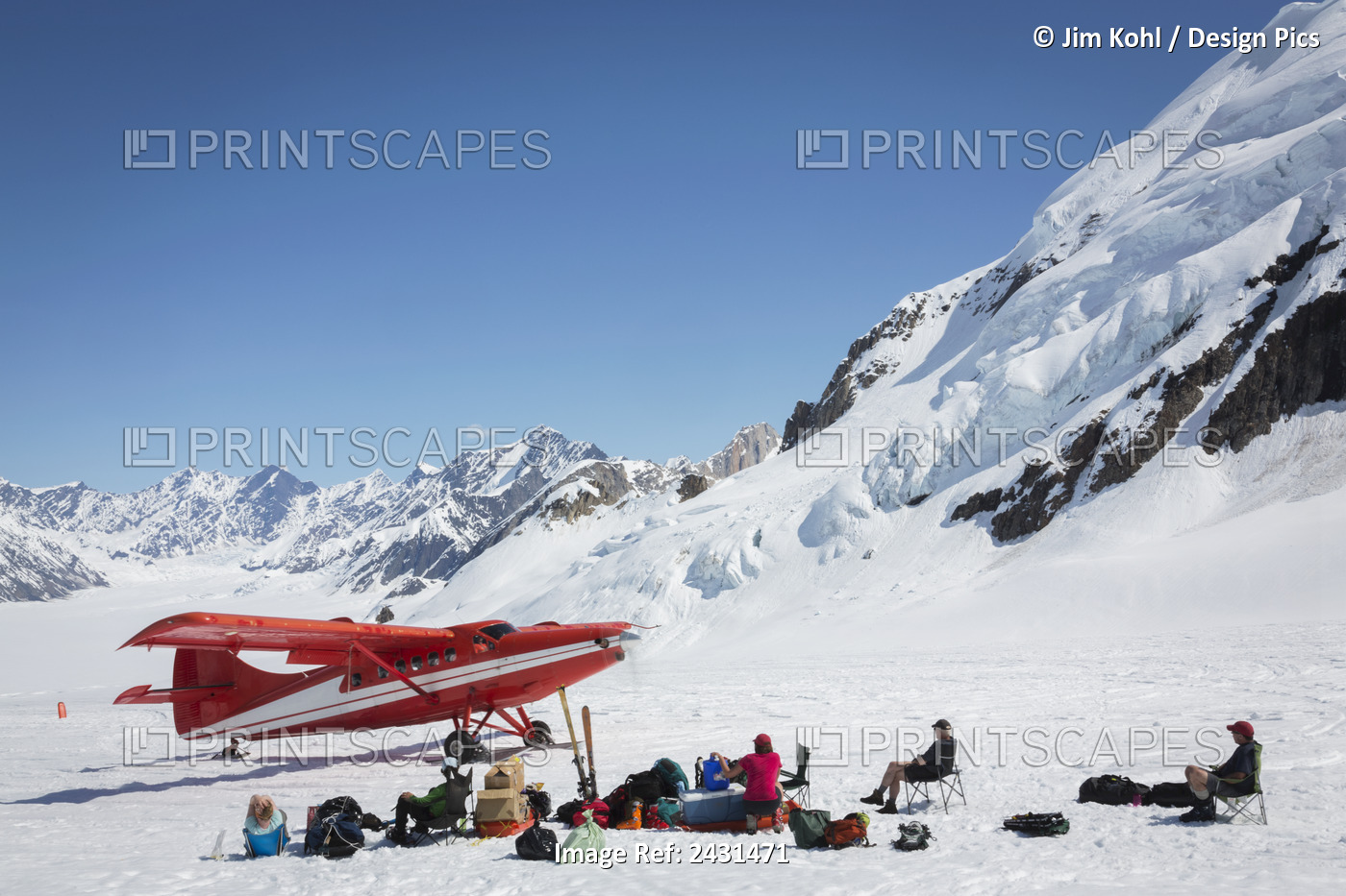 Group Of Visitors Awaiting Ski Plane Pick Up On The Ruth Glacier In The Alaska ...