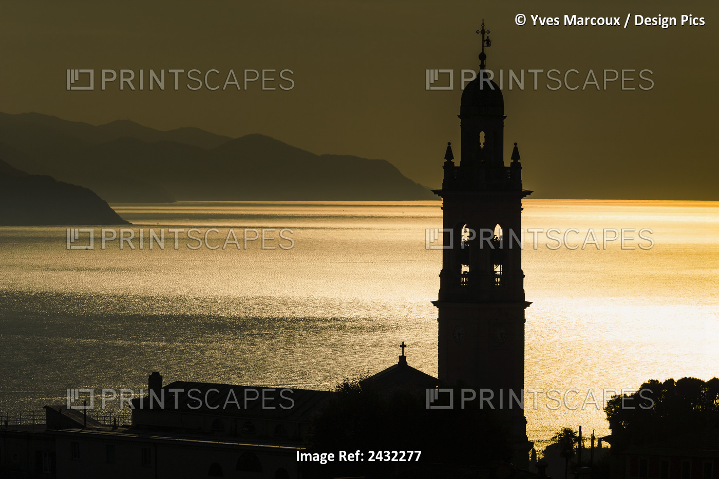 Golden Sunlight Reflected On Water At Dusk With Tower Of Church; San Lorenzo ...