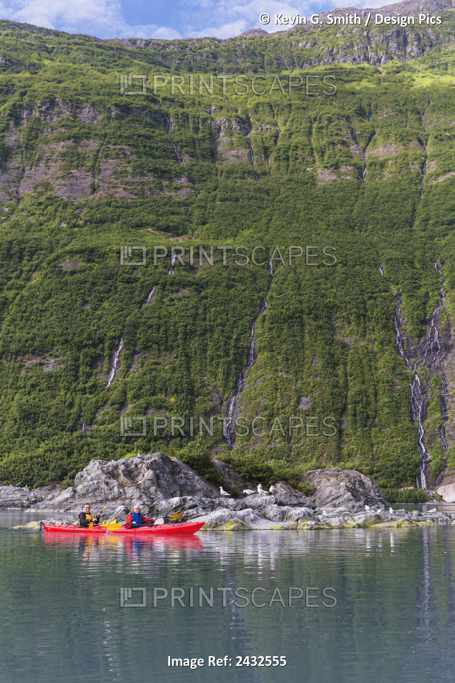 Couple Sea Kayaking In A Tandem Kayak In Shoup Bay State Marine Park, Prince ...