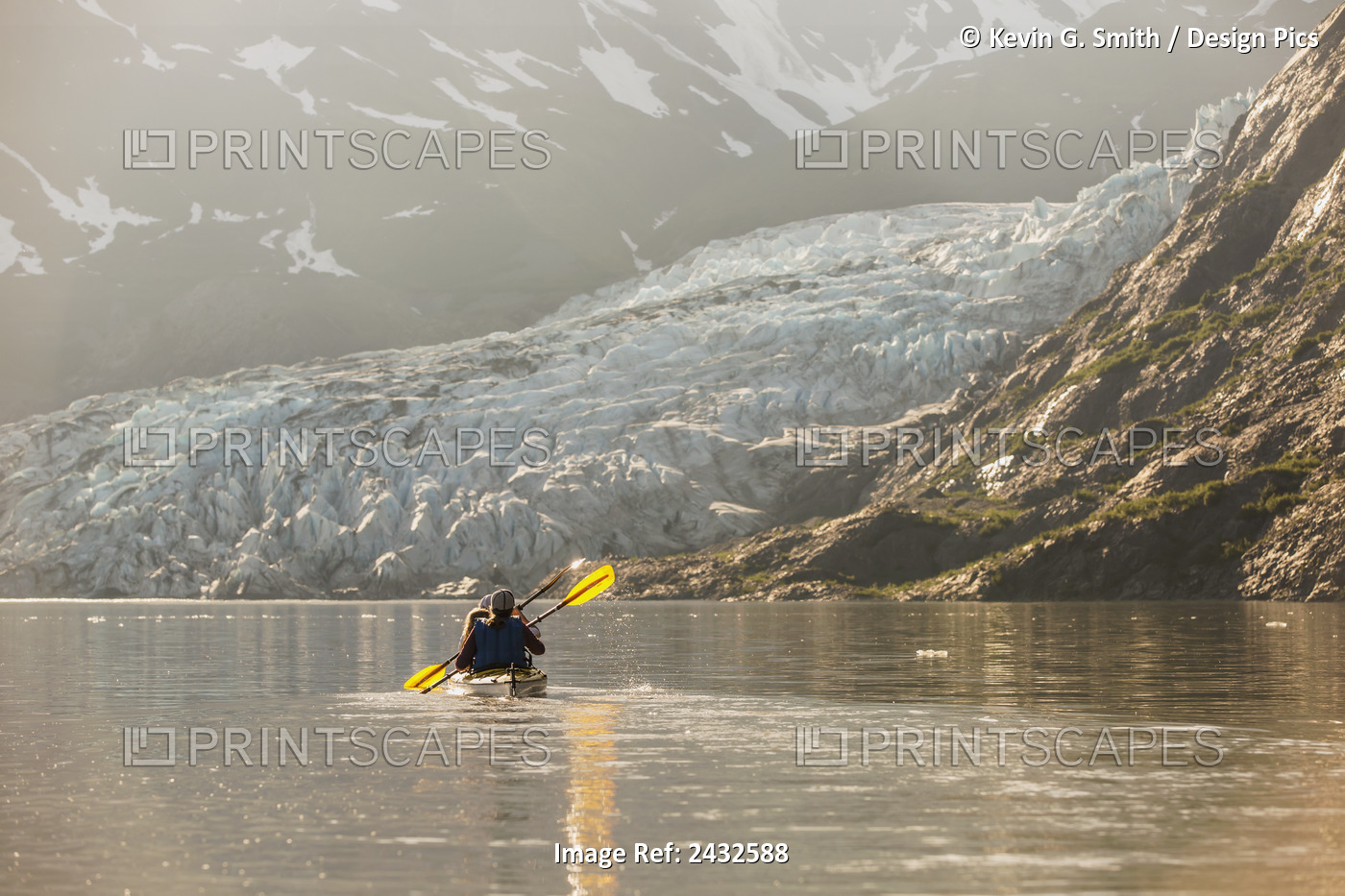 Sea Kayakers Paddling In Evening Light At Shoup Bay State Marine Park, Prince ...