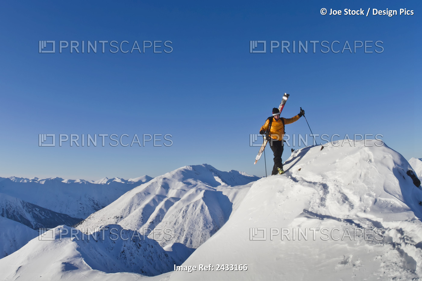 Man Climbing A Snow Ridge For Back Country Skiing, Turnagain Pass, Kenai ...