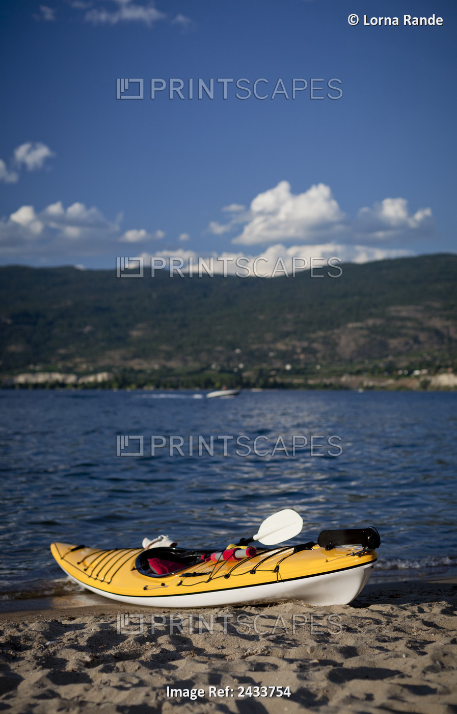Yellow Kayak On Beach Shore; British Columbia, Canada