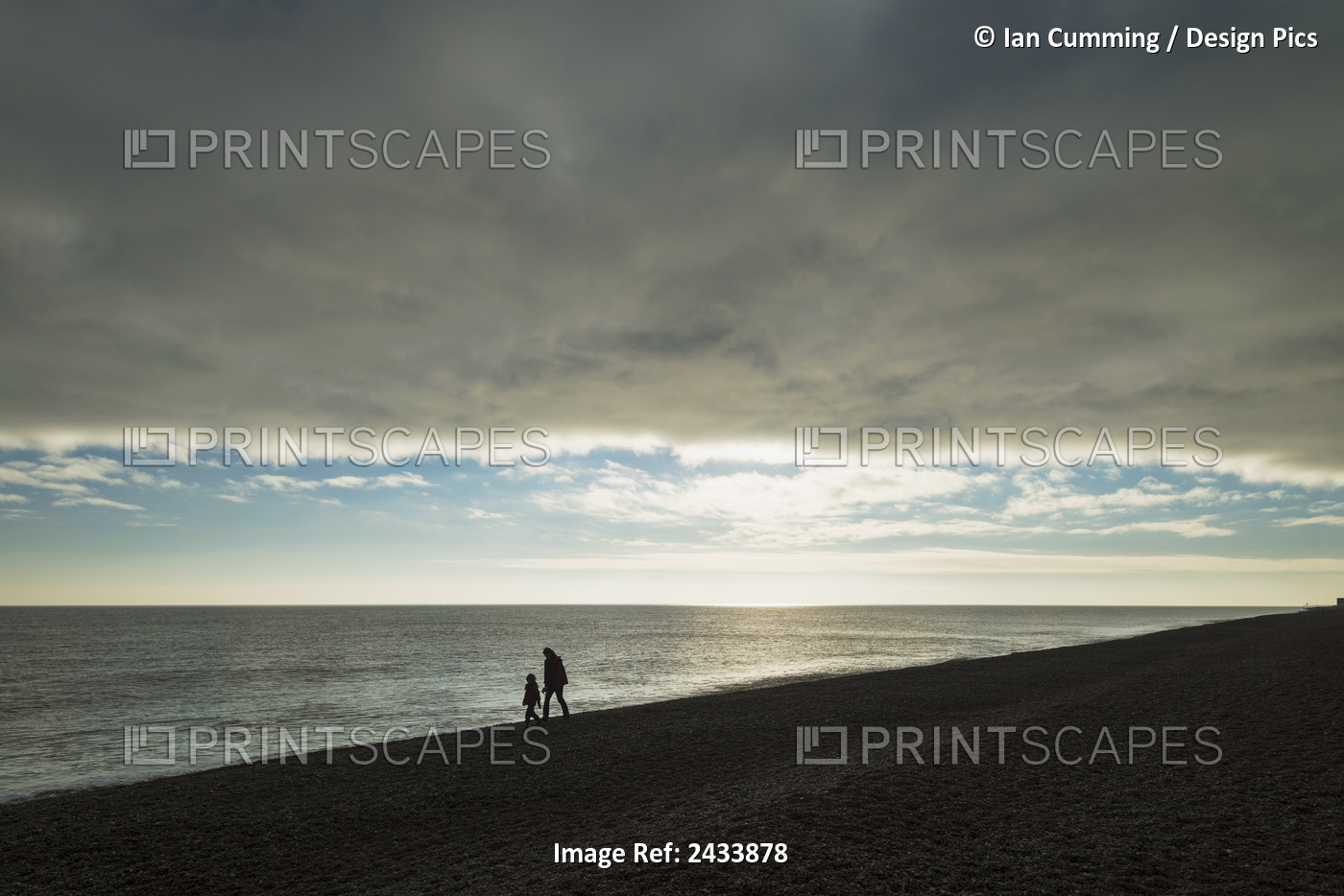 Mother And Daughter Walking Along Beach; Aldeburgh, Suffolk, England