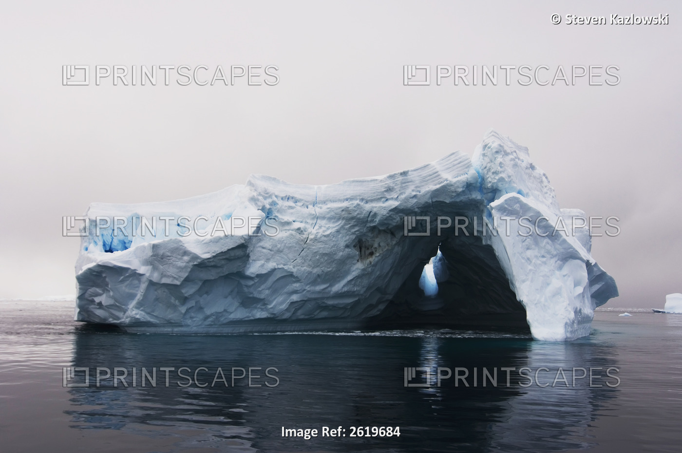 Iceberg Floating Off The Western Antarctic Peninsula, Antarctica, Southern Ocean