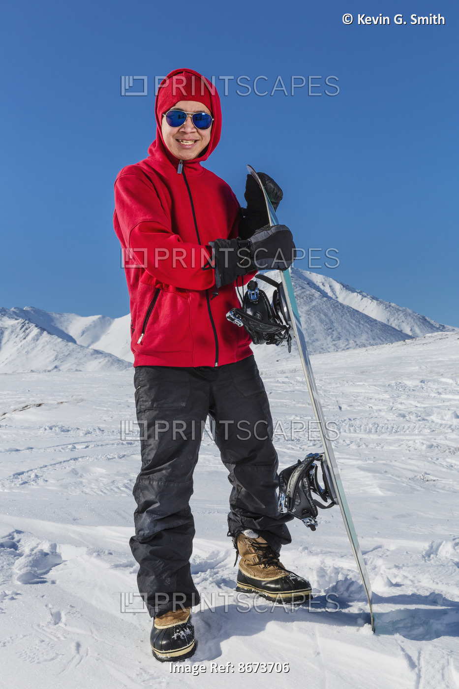 Portrait Of A Native Male Youth Standing Next To His Snowboard, Anaktuvuk Pass, ...