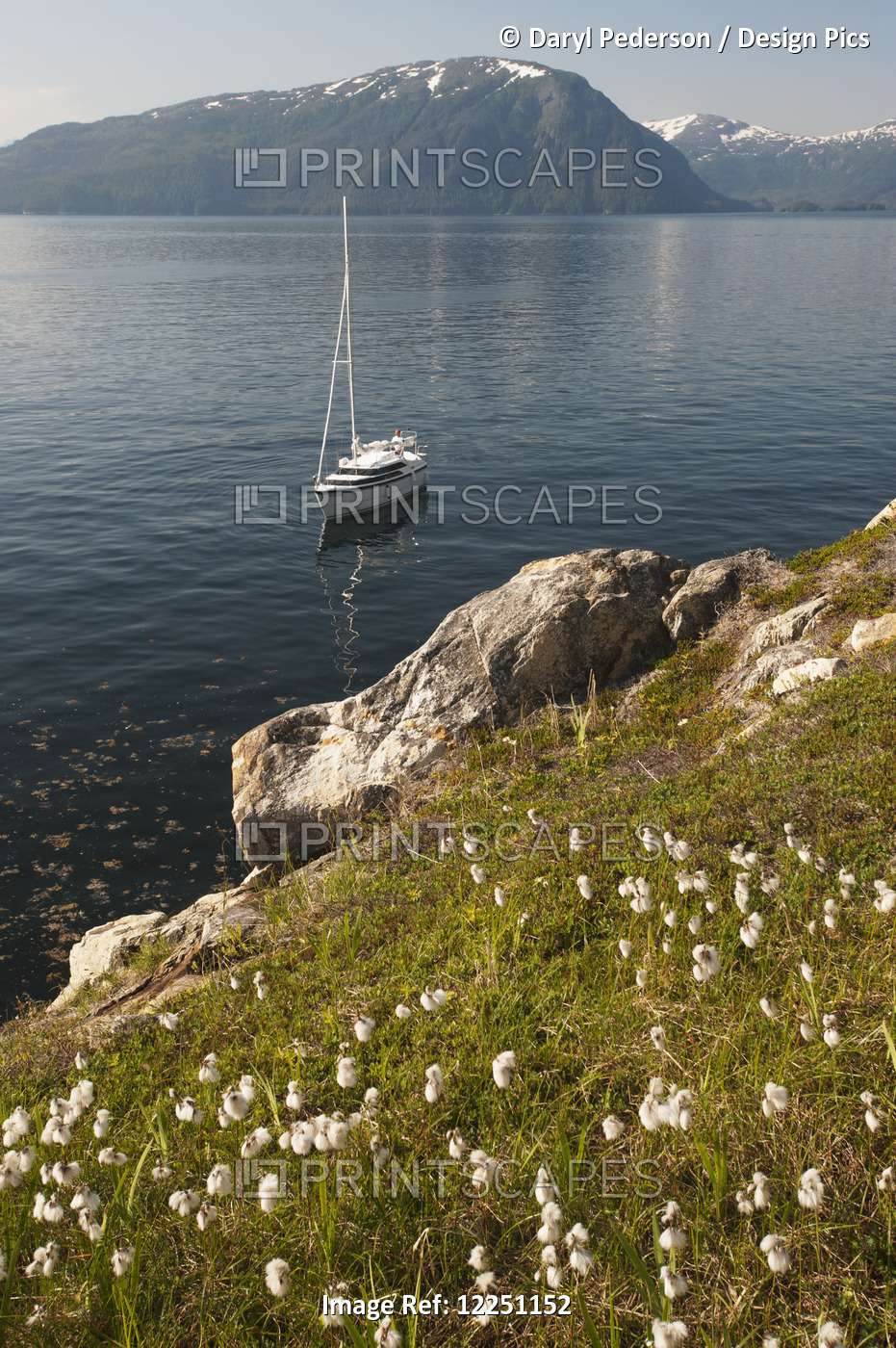 Sailboat Anchored Along The Coastline Of Prince William Sound, Southcentral ...