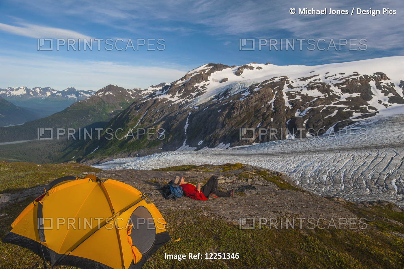 Backpacker At His Campsite On A Ridge Overlooking Exit Glacier, Kenai Fjords ...