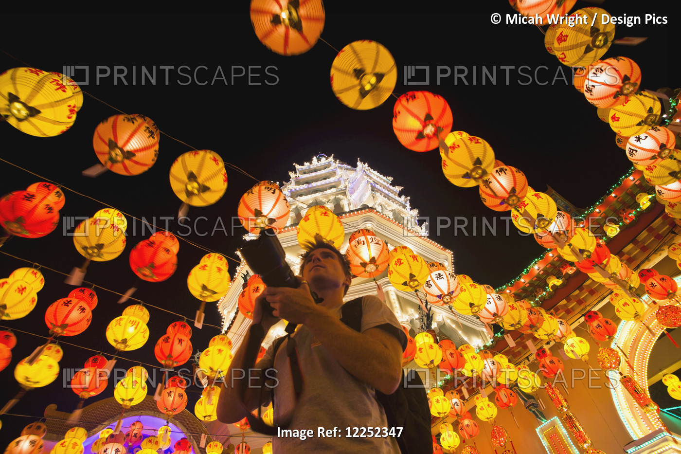 The Fantastic Lighting Of Kek Lok Si Temple And A Tourist With A Camera; ...
