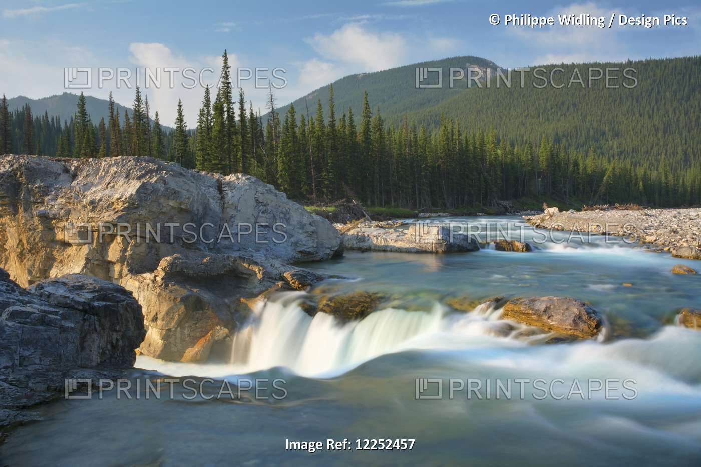 River And Waterfall In Morning Light; Bragg Creek, Alberta, Canada