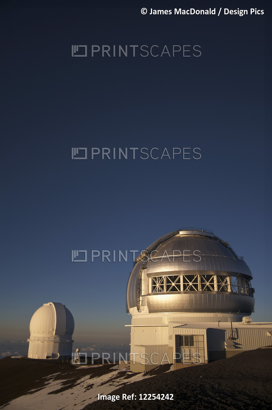 The Sun Sets Over The Summit Of Mauna Kea And The Domed Observatories And ...