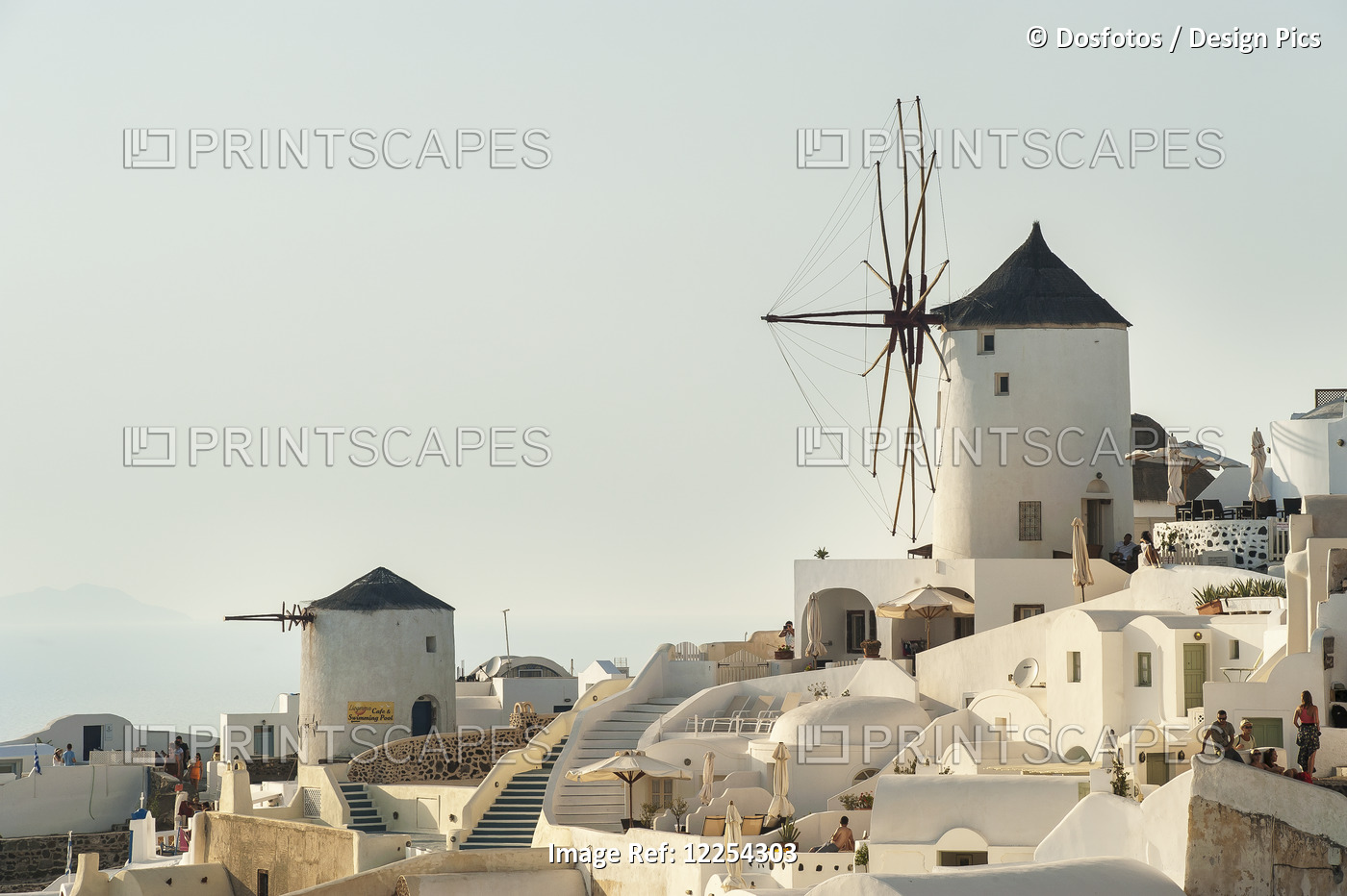 Whitewash Buildings And Windmill; Oia, Santorini, Greece