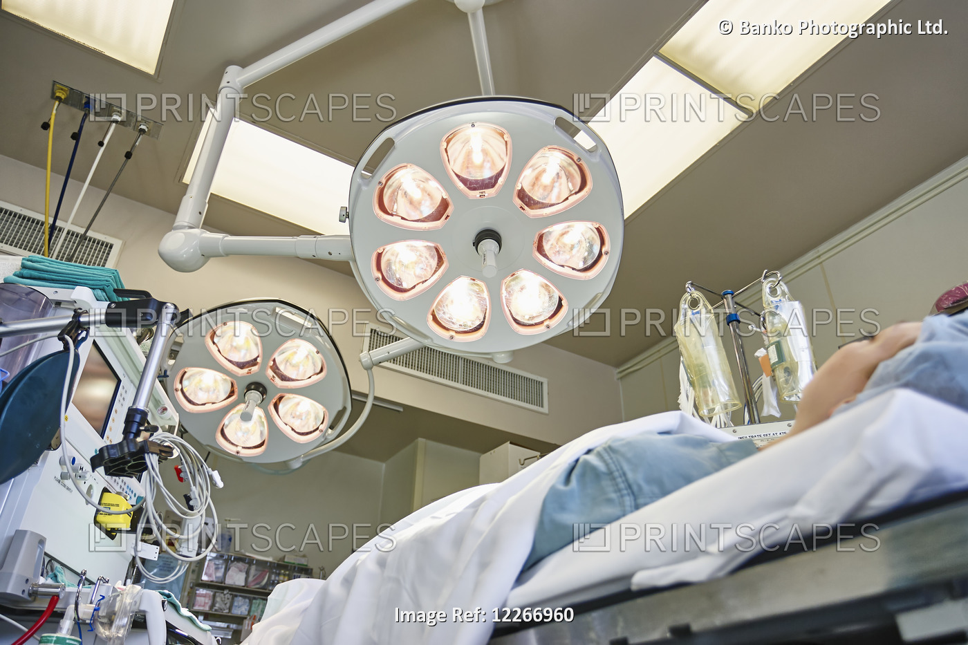 Caucasian Patient On Operating Table In Hospital Operating Room; Ontario, Canada