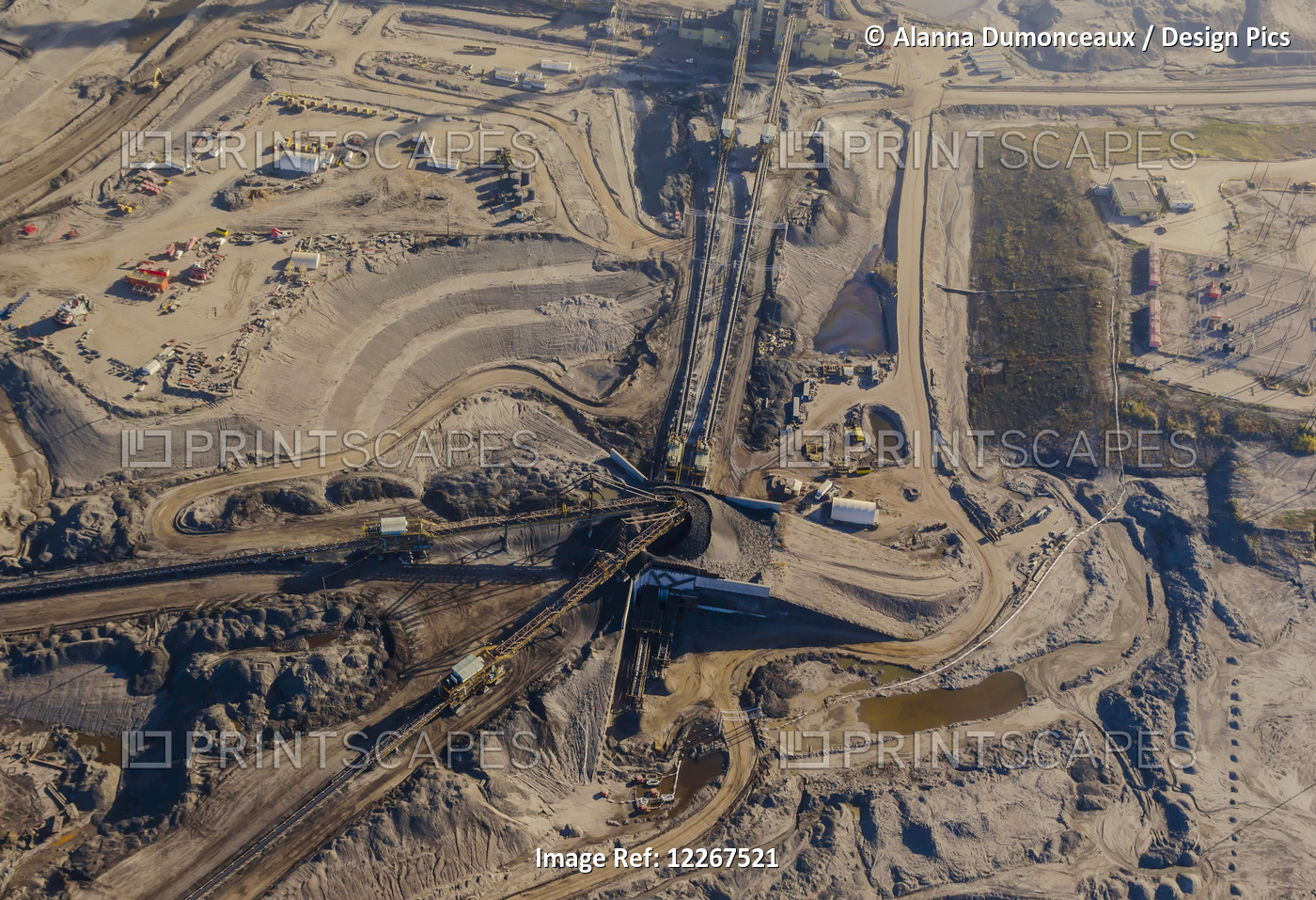 Aerial View Of An Oil Sands Refinery Work Site Showing Working Equipment, ...
